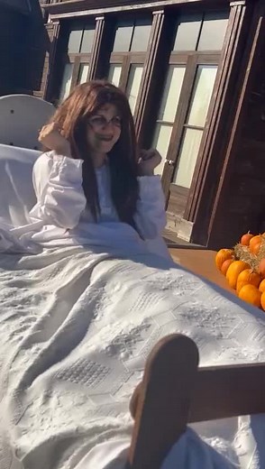 Playful Outdoor Fall Scene with Pumpkins