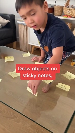 A fun, quiet learning game for your preschooler! All you need is some sticky paper, construction paper, markers, and a wall to make learning shapes really fun. #momtips #kidactivity #preschooler | Mom.com