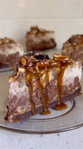 This No-Bake Turtle Cheesecake is gluten free, dairy free, paleo, and refined sugar free, and the ultimate holiday dessert. If you like chocolate, caramel, and pecan, this is a must make! Recipe in the comments! #TurtleCheesecake #NoBakeDessert #VeganCheesecake #ChocolateCaramel #CaramelPecan #ChocolatePecan #NoBakeCheesecake #GlutenFreeCheesecake #RefinedSugarFree | The Bigley Basics