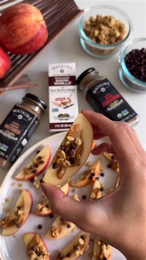 Back-to-school snack goals 🍎 Apple nachos drizzled with Watkins spices Baking Vanilla = the ultimate after-school treat. Bonus: so simple, the kids can help too! Find the recipe at the link in bio. #watkins1868 #afterschoolsnack #applenachos #easysnacks | Watkins
