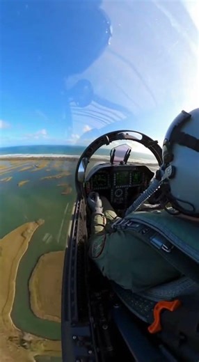 Ultra realistic 8K side cockpit view of a fighter jet performing a straight low altitude pass