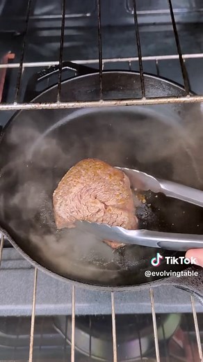 Learn How to Cook Filet Mignon in the Oven using a cast iron skillet to sear the crust and then bake until perfectly cooked and tender!