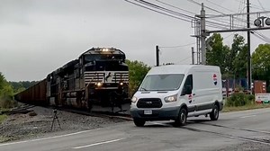 Train enthusiast captures heart-stopping moment as van escapes being hit by train