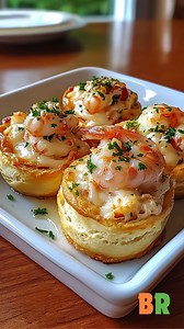 Shrimp and Crab-Stuffed Biscuit Bomb Shells These golden biscuit bombs are loaded with creamy shrimp and crab filling—cheesy, zesty, and baked until perfectly crisp. The ultimate comfort bite in every shell. Ingredients: 1 can refrigerated biscuit dough 1 cup cooked shrimp, chopped 1 cup lump crab meat 1/2 cup cream cheese, softened 1/4 cup mayonnaise 1 tablespoon Dijon mustard 1 tablespoon lemon juice 1 teaspoon garlic powder 1/2 teaspoon onion powder Salt and pepper to taste 1/4 cup chopped gr