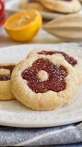 🌼Flower Thumprint Lemon cookies🌼Buttery and crumbly cookies exploding with lemon flavor and sweet strawberry jamHere is my recipe for you. Happy baking 😘INGREDIENTS* 7 oz (200 gr) butter, cubed and at room temperature* 1/2 cup (100 gr) granulated sugar* zest of 2 lemons* 1 tablespoon fresh lemon juice* 1 teaspoon vanilla extract* 2 cups (240 gr) all-purpose flour* pinch salt* 1/3 cup strawberry preserves* powdered sugar to sprinkle on topINSTRUCTIONS: link in profile and comments🥰🫶🏻#cookie