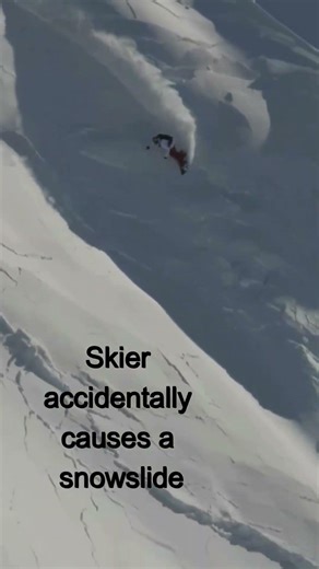 Skier accidentally causes a snowslide