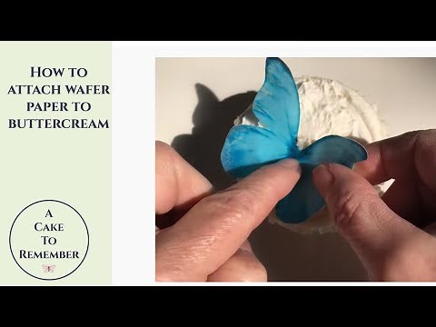 How to attach wafer paper butterflies to buttercream Tips for edible butterfly cake decorations