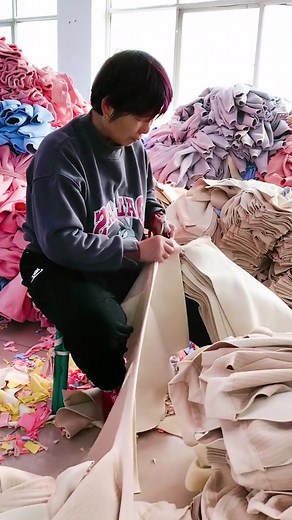 Textile Processing: Fabric Cutting in Action