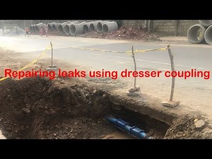 Dresser coupling to repair leaks on pvc pipes