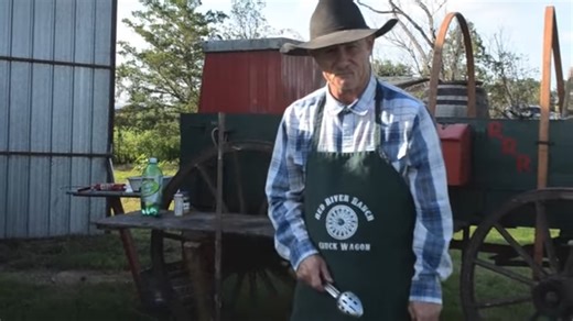 The Dutch oven setup for "camp potatoes" with a crispy finish