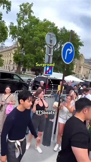 vmin walking through the crowd during fashion week 😎