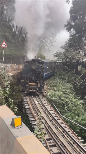 Dr.Biswadip Nag on Instagram: "Darjeeling Himalayan Railway: The little blue trainThe Darjeeling Himalayan Railway (DHR) steam engines, primarily 125-year-old vintage British-built B-Class locomotives (0-4-0 ST), are iconic 2ft narrow-gauge engines operating on a UNESCO World Heritage line. These coal-fired, 140-year-old engineering marvels still chug through the Himalayas daily, famously powering tourist “Joy Rides” between Darjeeling and Ghum. . . . . . . . #steamengine #darjeeling #joyride #g