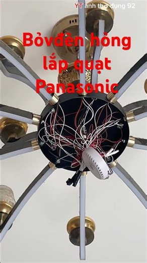 Remove the broken light bulb attached to the Panasonic F-60FEN ceiling fan.