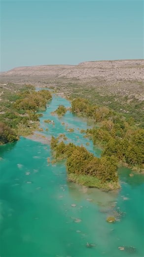 𝐓𝐡𝐞 𝐃𝐞𝐯𝐢𝐥𝐬 𝐑𝐢𝐯𝐞𝐫 𝐄𝐚𝐠𝐥𝐞𝐬 𝐍𝐞𝐬𝐭 𝐇𝐢𝐝𝐞𝐚𝐰𝐚𝐲 Escape to this stunning 65± acre riverfront gem in Val Verde County, Texas. Just 19± miles from Comstock and 51± miles from Del Rio, this ranch is your gateway to outdoor adventures. With 650± feet of pristine Devils River frontage, you’ll enjoy turquoise waters perfect for kayaking, fishing, and swimming in deeper holes. The cozy 2,000± sq/ft home features rustic charm with modern comforts, including a wraparound patio boasti