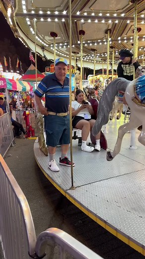 Exploring Ornate Carousel Horses in Amusement Parks