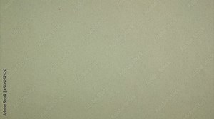 Footprints appear on sand background. Minimalistic banner of imitation of walking on sand. Stop motion