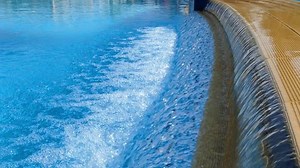 clip-8564938-water-splashing-down-into-pool-4k