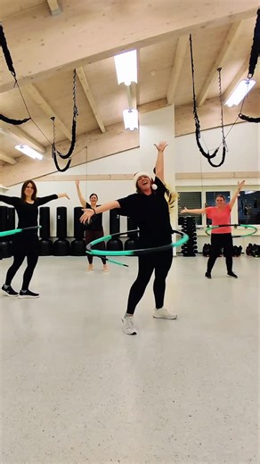 Hula Dancercise | Hula Hoop Dance Fitness | Hoopin’ into the holidays with @evelyne_hoop and her hoopies like… 🎄💫 #rockinaroundthechristmastree #hulahoop #huladancercise #reels... | Instagram