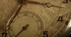 Download Extreme close up shot of clock hands moving from 3:30 to 5:40 in 4K time lapse for free