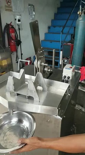 Efficient Coconut Peeling and Cutting Machine in Action