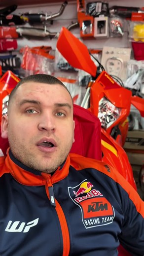 KTM Racing Team Gear and Motorcycle Showcase