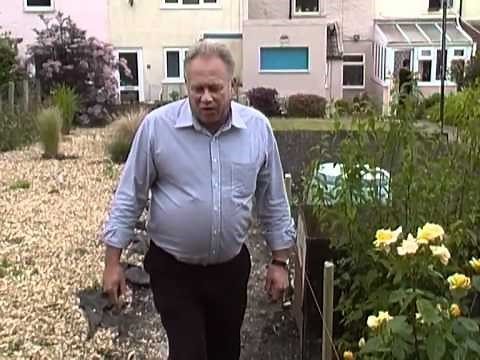 How to Lay Weed Block under a Garden Path