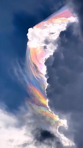 A fire rainbow/stunning cloud iridescence! This is the mother of all atmospheric optical events! This beautiful cloud iridescence appears when sunlight, at just the right angle, intermingles with tiny ice crystals that create a prismatic effect at the top of a storm, producing the morphing rainbow effect! The colors and patterns change as the ice crystals get pushed around by upper winds around the storm! This phenomenon can also be called a "fire rainbow". #FireRainbow Video taken in Medellin, 