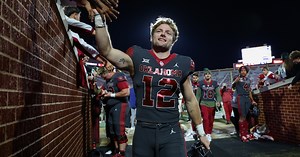 Drake Stoops reacts to fight vs. West Virginia, Dillon Gabriel, teammates defending him