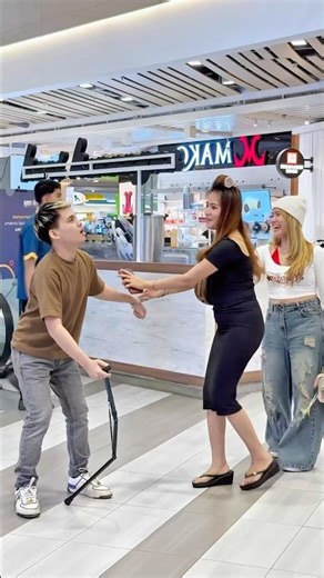 Handcuff escalator prank😂