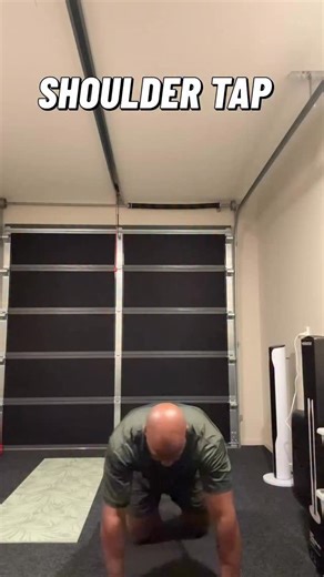 Shoulder taps are a simple but effective bodyweight exercise often used to build shoulder stability, core control, and general upper body strength. You start in a high plank position with your hands under your shoulders, body straight from head to heels, and then lift one hand to tap the opposite shoulder — alternating sides. The main goal is to keep your hips and torso as still as possible while you lift each hand, so you’re not rocking side to side. That stability demand means your shoulders, 