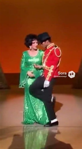 Elegance Meets Energy: Elizabeth Taylor's Unlikely Dance Duel in a '70s TV Studio