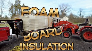 Unloading foam board insulation for DIY metal garage
