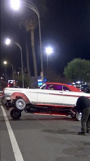 Rag Top 61 Impala LOWRIDER leaving a car show in 3 wheel motion, IN FRONT OF THE POLICE!