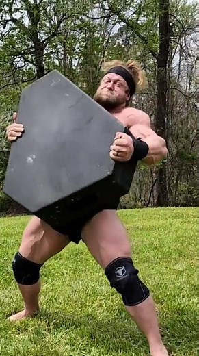 Man Show Incredible Weight Lifting Abilities By Lifting Heavy Objects In Their Backyard - 1310667