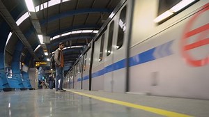 Indian Metro Railway Station Timelapse With Trains Arriving at Departing and Commuters Boarding Train in New Delhi, India - March 2019