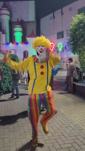 Joyland Joker Mascots Parade at Amusement Park