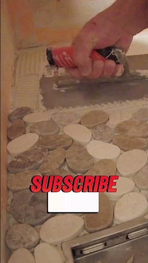 Single set Pebble tile floor #diy #showerfloor #construction #tiles