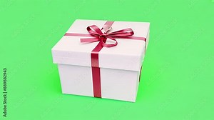 White gift box with red ribbon on green screen background with Ai generated.
