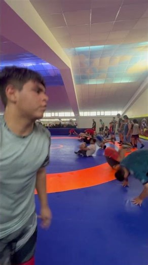 “Wrestling practice: sweat, technique, focus, repeat.”