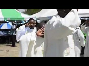 Catholic priests dancing