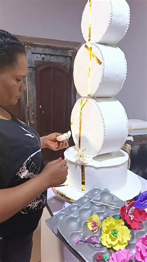 Today was all about the 5-tier gravity-defying standing cake 🎂✨ From stacking to balancing, measuring every angle and trusting the process — this cake tested my skill, patience, and creativity. Five tiers standing strong, defying gravity, and proving once again that with knowledge, experience, and God’s grace, nothing is impossible. It wasn’t just baking today, it was engineering, artistry, and pure passion in motion. Moments like this remind me how far I’ve come and why I’ll never stop learnin