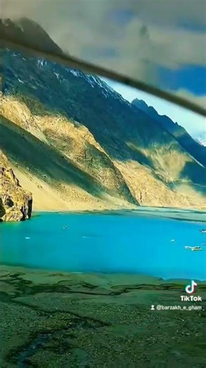 “From the dark kiss of the tunnels to the turquoise calm of Attabad.#AttabadLake #Travel #Pakistan