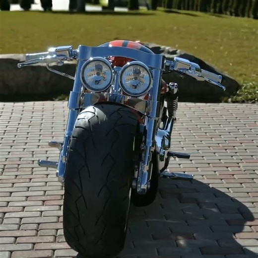 Harley-Davidson V-Rod. This model features a wide rear wheel and chrome accents.