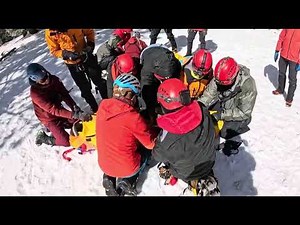 Hoist rescue of two injured hikers after two frozen nights on the mountain.