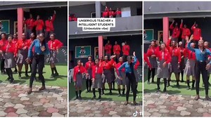Video shows cute female teacher dancing with her intelligent students in school