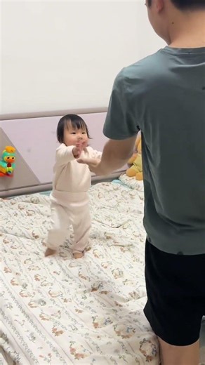 The two little babies who hadn't seen their father for a day ran to him
