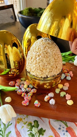 Candy Surprise Rice Krispie Eggs!🍬 Making my girls these fun Easter treats today! You can use any kind of candy and any size of egg! 1. Make Rice Krispies as you normally would: - 3 tablespoons butter melted - add bag of mini marshmallows - once melted together remove from eat, add 6 cups cereal and stir to combine. 2. Spray the insides of eggs, and add Rice Krispie mixture to each end. Press into edges, leaving a little hole in the middle. 3. Add any candy surprise to the hole part. 4. Close e