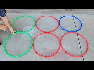 He lays 6 hula hoops on the ground for this BRILLIANT backyard idea!