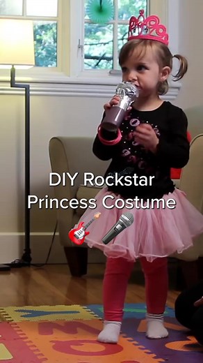 It’s the microphone for us. 🥺 🎤 Calling all tiny American Idols! This DIY Halloween costume couldn’t be easier. Just some iron-on letters, a tutu (you know you’ve got one somewhere) and a toilet-paper-roll-turned-microphone later, you’ll have the coolest rockstar princess ready to take the stage. #halloweencostume #diyhalloween #halloweenforkids #kidshalloweencostume | Care.com