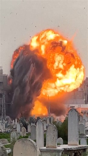 The Israeli army struck a building in Gaza City on Friday after issuing a warning. The building, near a cemetery in Zeitoun, was flattened on video. No casualties were reported as it had been evacuated. | AP